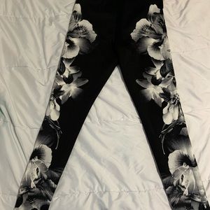 Express tights size small. Flower pattern